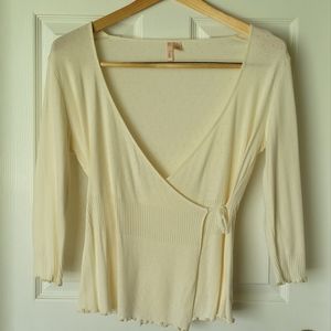 Anthropologie Eloise cream wrap top